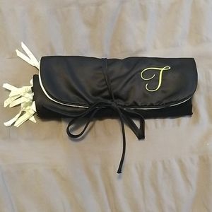 Travel jewelry case with T embroidery